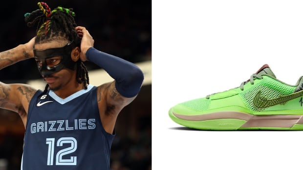 Memphis Grizzlies guard Ja Morant next to his green Nike sneakers.